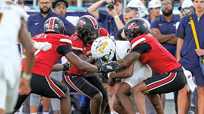 Louisville outlasts Toledo 27-22 in chaotic Boca Raton Bowl finish
