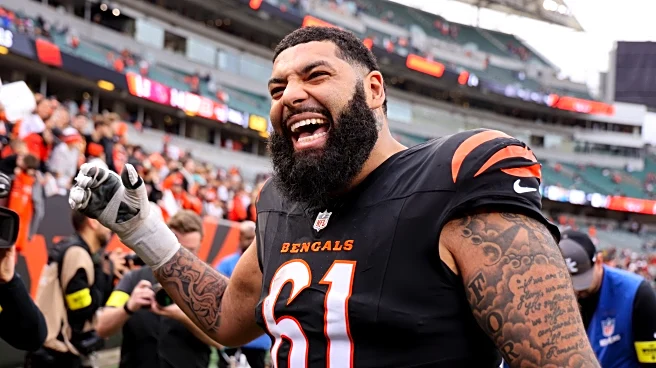 Cody Ford and Joe Burrow react to NFL history-making catch vs. Cardinals