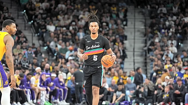 Stephon Castle honors a fan with his game-worn shoes