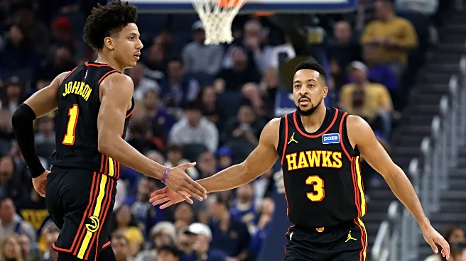 McCollum, Kispert make Atlanta debuts as Hawks breeze by Warriors