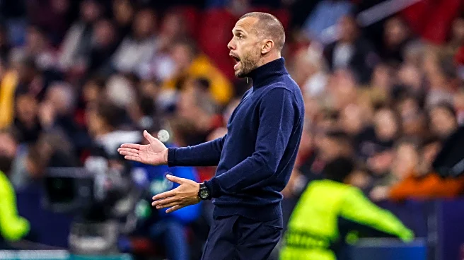 Tottenham announce appointment of John Heitinga as assistant coach