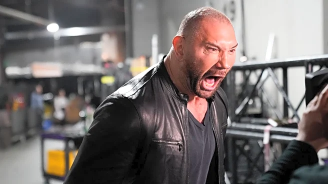 Booker T says Batista is ‘crying wolf’ over their backstage fight in WWE