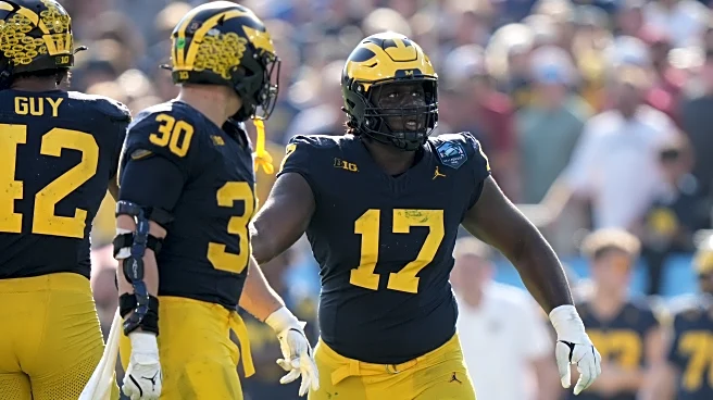 DL Enow Etta withdrawing from transfer portal, returning to Michigan