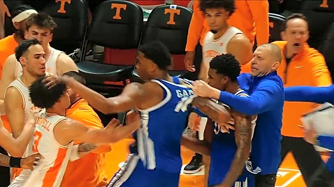 Mark Pope was holding on for dear life to pull Otega Oweh and Brandon Garrison from skirmish at Tennessee