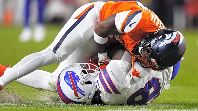 Game balls for the Denver Broncos 33-30 OT win over the Buffalo Bills