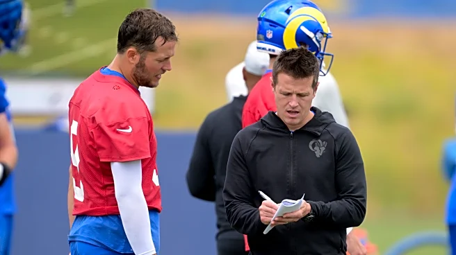 What quarterbacks has Mike LaFleur worked with?