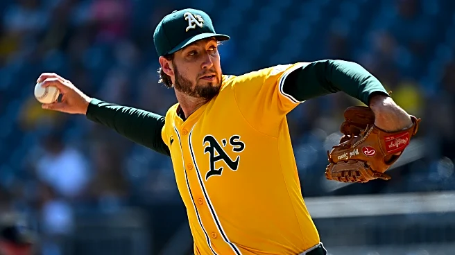 Royals acquire pitcher Mitch Spence from the A’s