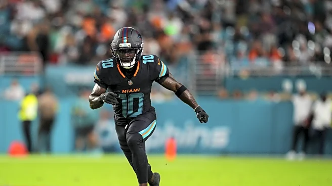 Dolphins release Tyreek Hill as cap cuts continue