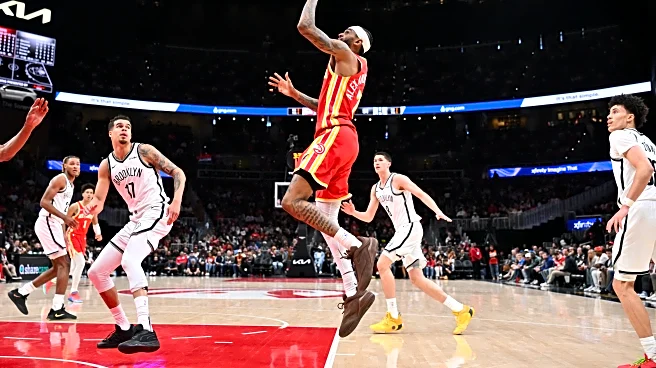 Hawks overcome 11-point fourth quarter deficit to defeat Nets 115-104