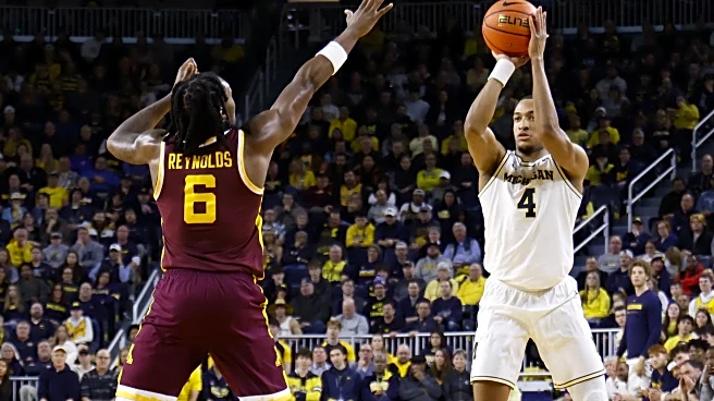 Michigan uses second-half surge to defeat Minnesota, 77-67