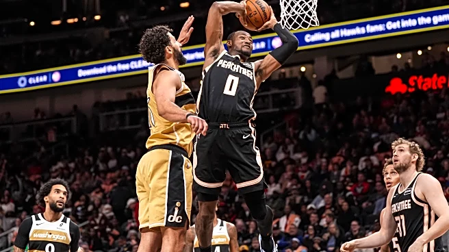 McCollum, Kispert lead way as short-handed Hawks throttle Wizards