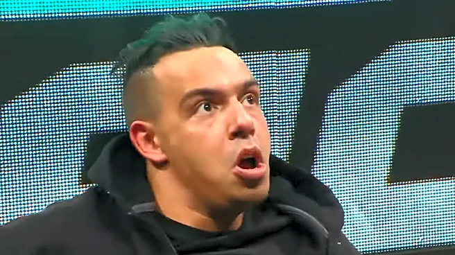 Masked man exposed on SmackDown has ties to Seth Rollins