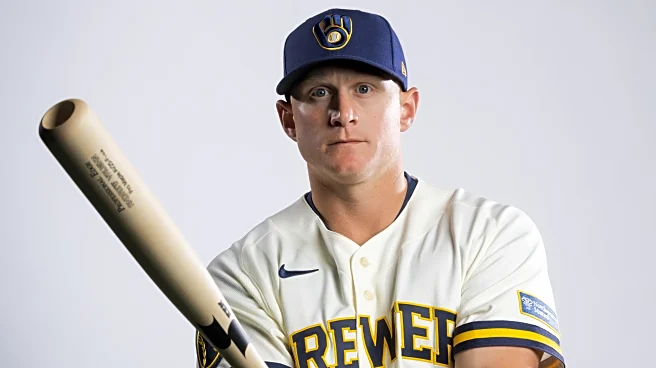 Brewers lose to Reds 9-7 despite hit parade