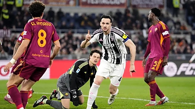 Last-gasp goal vs. Roma keeps Juventus in Champions League race