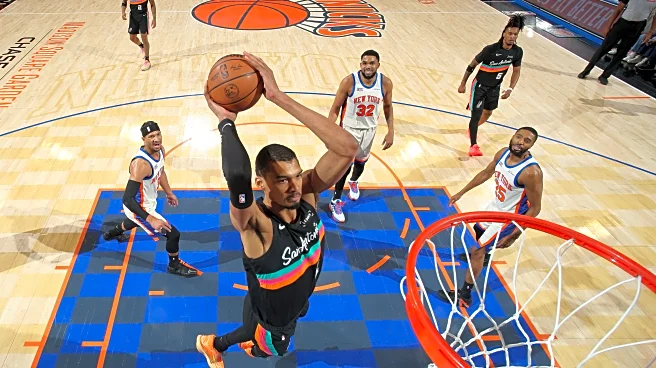 Spurs snap 11-game winning streak in New York