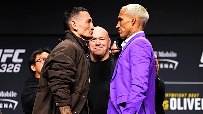 Max Holloway, Charles Oliveira share stoic faceoff ahead of ‘BMF’ title fight at UFC 326