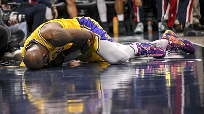 LeBron James says elbow ‘pretty sore’ after fall during Nuggets loss