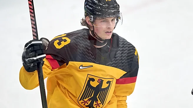 Bruins acquire forward Lukas Reichel from Vancouver