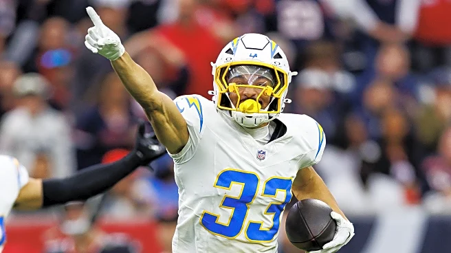 Chargers re-sign special teams trio for