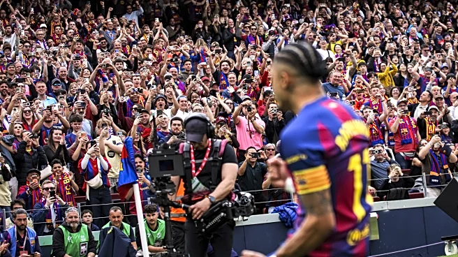 A day at the new Camp Nou as Barcelona beat Sevilla on election day
