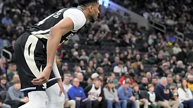 Giannis to miss time with hyperextended knee, bone bruise