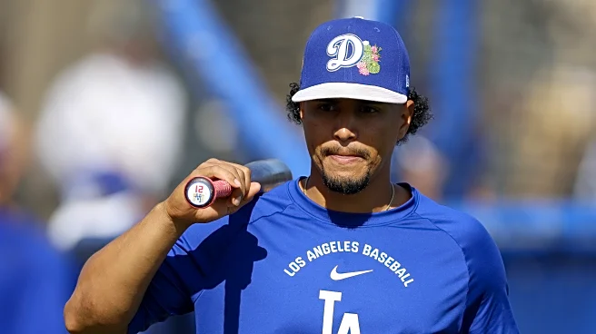 Dodgers add Santiago Espinal to roster