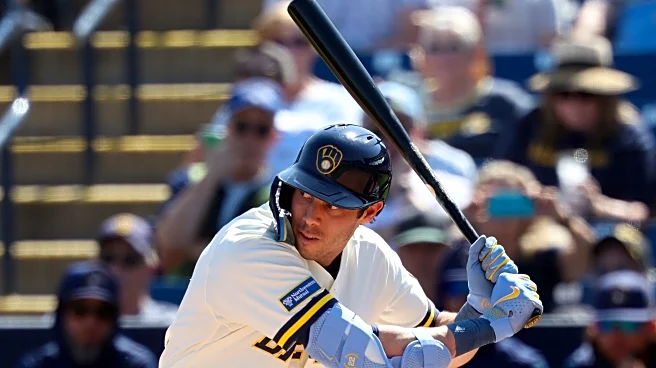 Trio of home runs leads Brewers to 11-4 win over Rangers