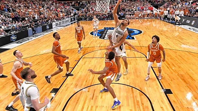 Texas loses heartbreaker on last-second tip in for 79-77 loss to Purdue