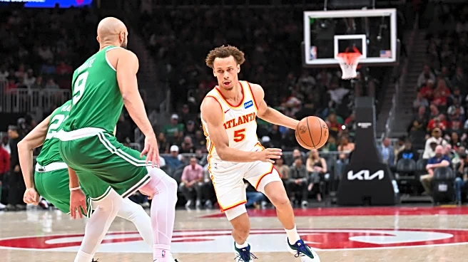 Hawks hold on to defeat Celtics 112-102 for 13th straight home win