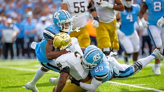 Which Notre Dame opponent is the THIRD game on a two game schedule?