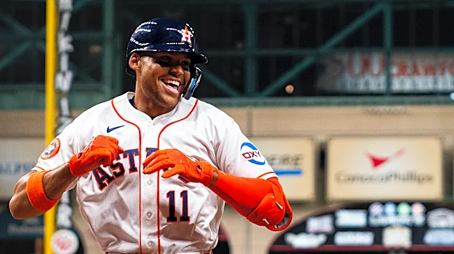 Rooker’s Two Homers Foil Astros 12-10 in 10 Innings