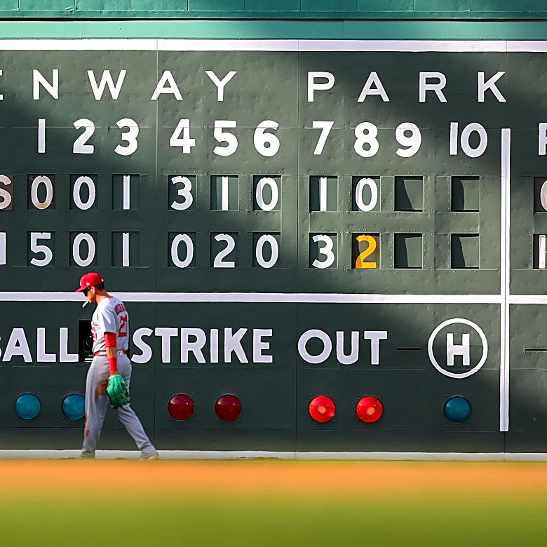 Which franchise has fallen further, the Red Sox or the Cardinals?
