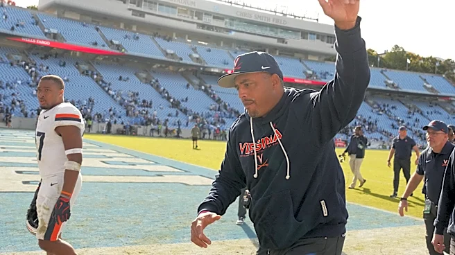 UVA football head coach Tony Elliott signs contract extension through 2030