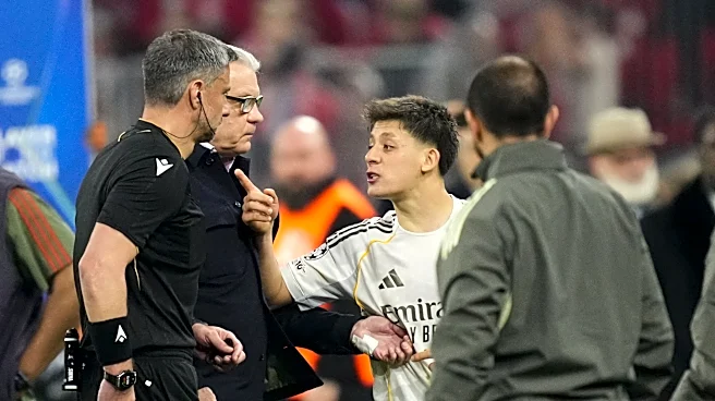 Real Madrid players berate referee as he tries to leave pitch vs. Bayern Munich