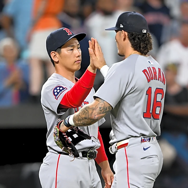 How does the outfield logjam play out inside the Red Sox clubhouse?