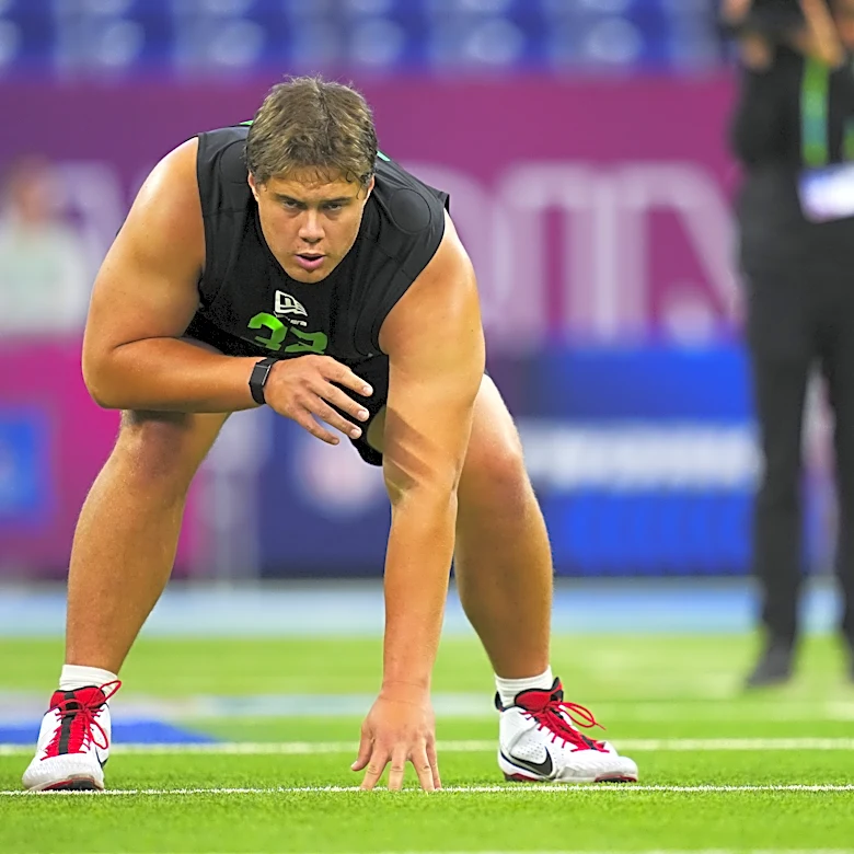 Adam Schefter believes the 49ers will look to trade out of pick No. 27