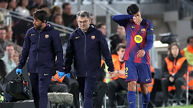Joao Cancelo forced off injured in first half of Barcelona’s clash with Celta