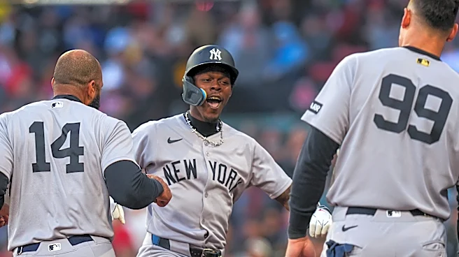 Yankees sweep Red Sox with late rally at Fenway