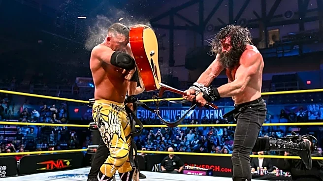 Elijah wins TNA’s first-ever Guitar Strap Match