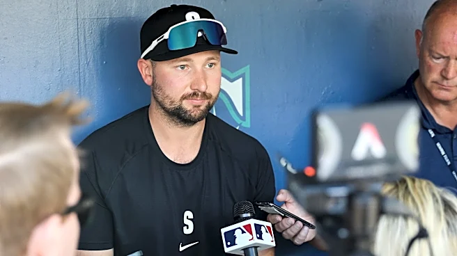 Cal Raleigh out of Mariners lineup for second day with right side pain