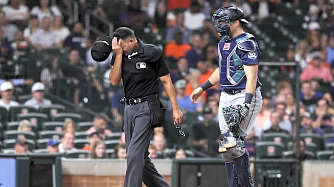 Mariners lose game, umpire, maybe Cal Raleigh in extras