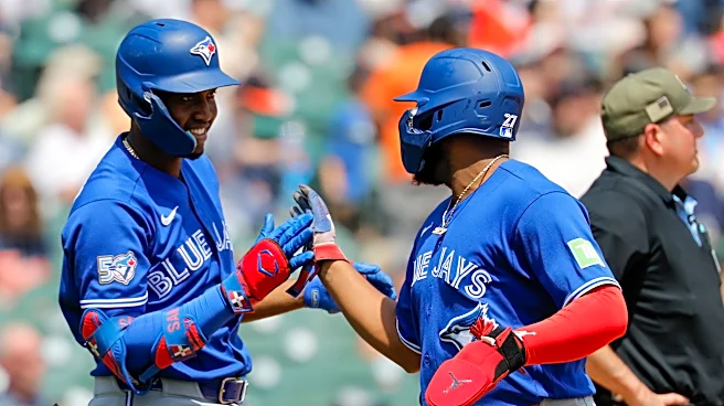 Vlad Homers, Jays Beat Tigers