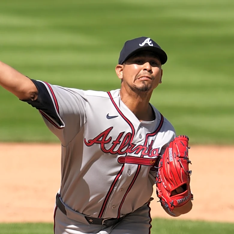 Braves re-add Carlos Carrasco, option Victor Mederos