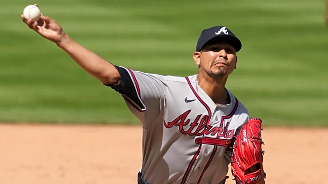 Braves re-add Carlos Carrasco, option Victor Mederos