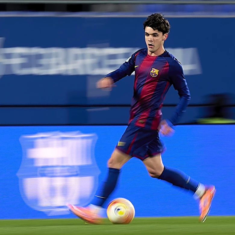 Hansi Flick takes a check on La Masia right-back in Barcelona training