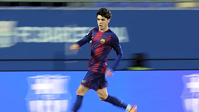 Hansi Flick takes a check on La Masia right-back in Barcelona training