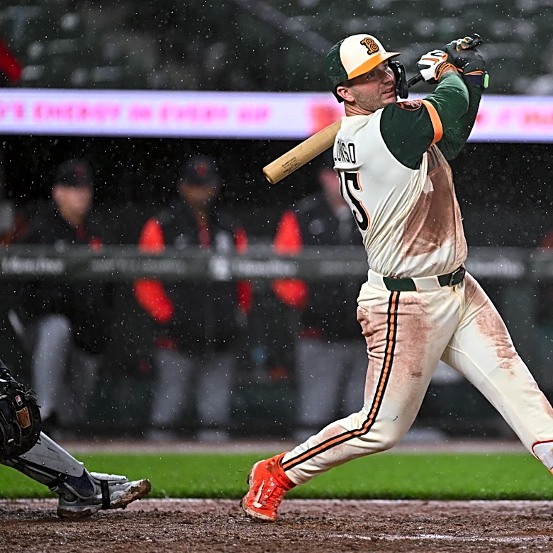 Orioles overcome Tigers and torrential rain with 7-4 win