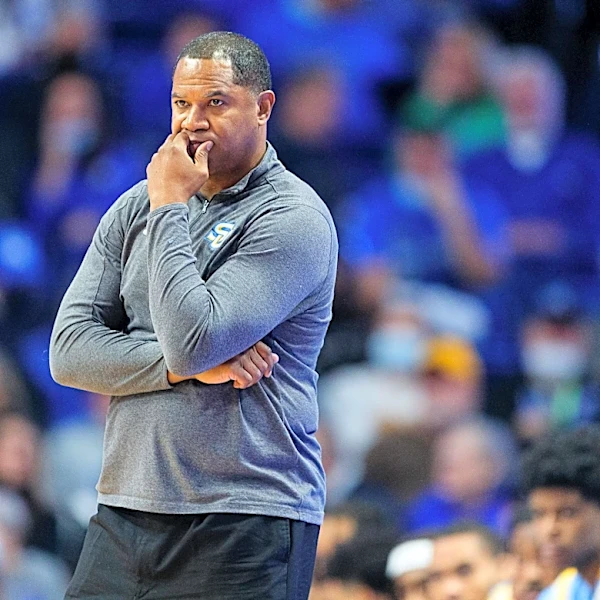 New lawsuit claims school officials concealed misconduct by Scott County coach Sean Woods
