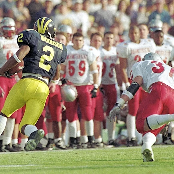 Who are the top father/son duos to play football at Michigan?