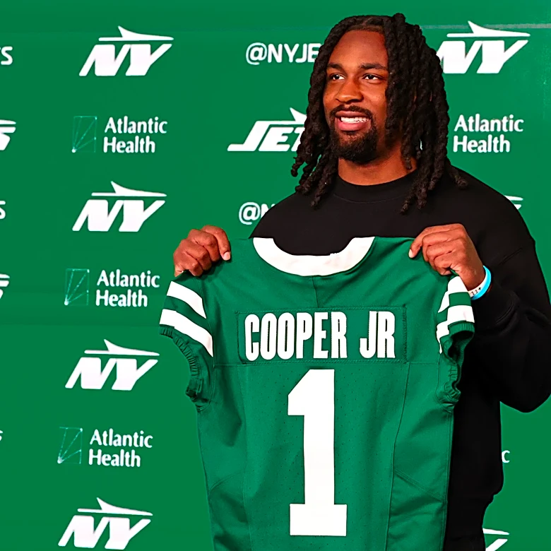 Omar Cooper signs his rookie contract
